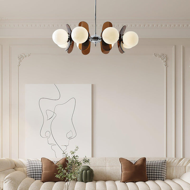 Stylish modern petal pendant light illuminating a dining area beautifully.