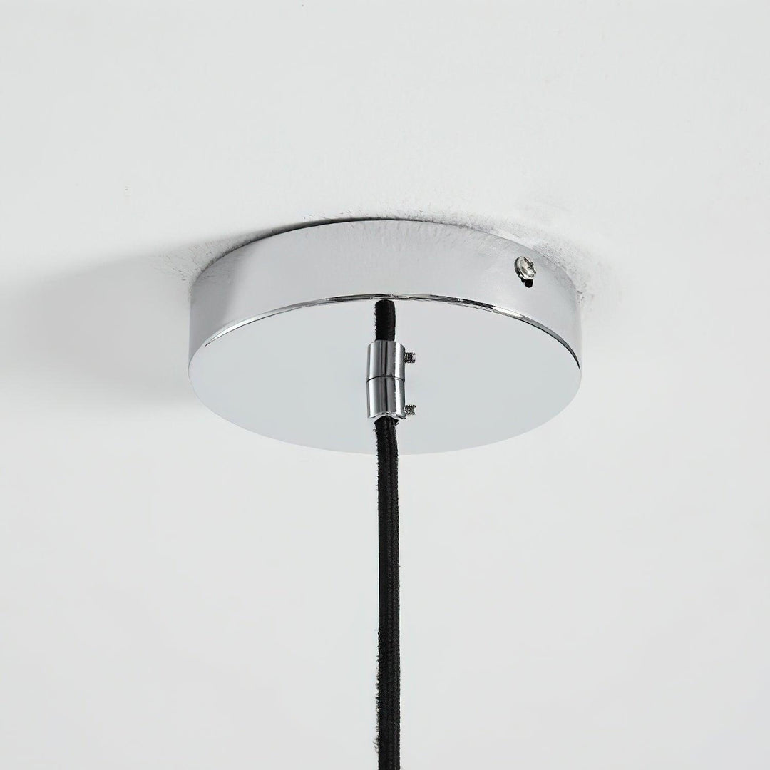 Modern petal chandelier with adjustable height for dining.