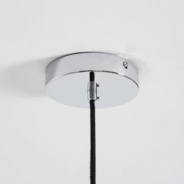 Modern petal chandelier with adjustable height for dining.