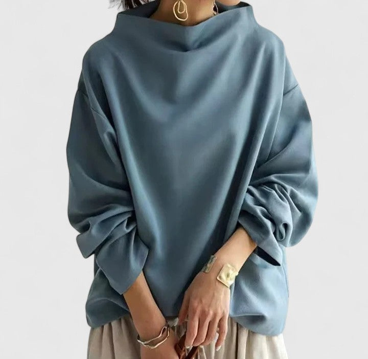 Chic women's high neck top with long sleeves, offering a versatile & classic style for everyday elegance.