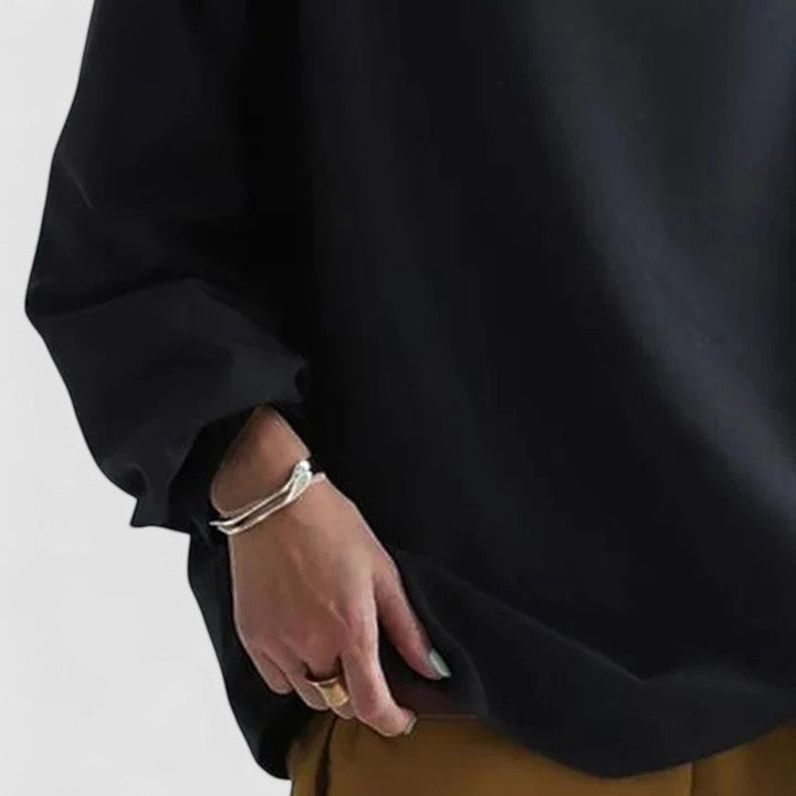 Women's elegant high neck top with long sleeves, offering a comfortable yet chic look for versatile styling.