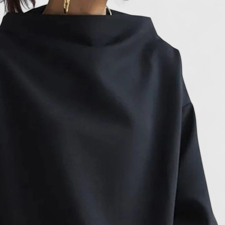 Modern elegant high neck long sleeve top, ideal for women seeking a versatile & chic addition to their fashion.