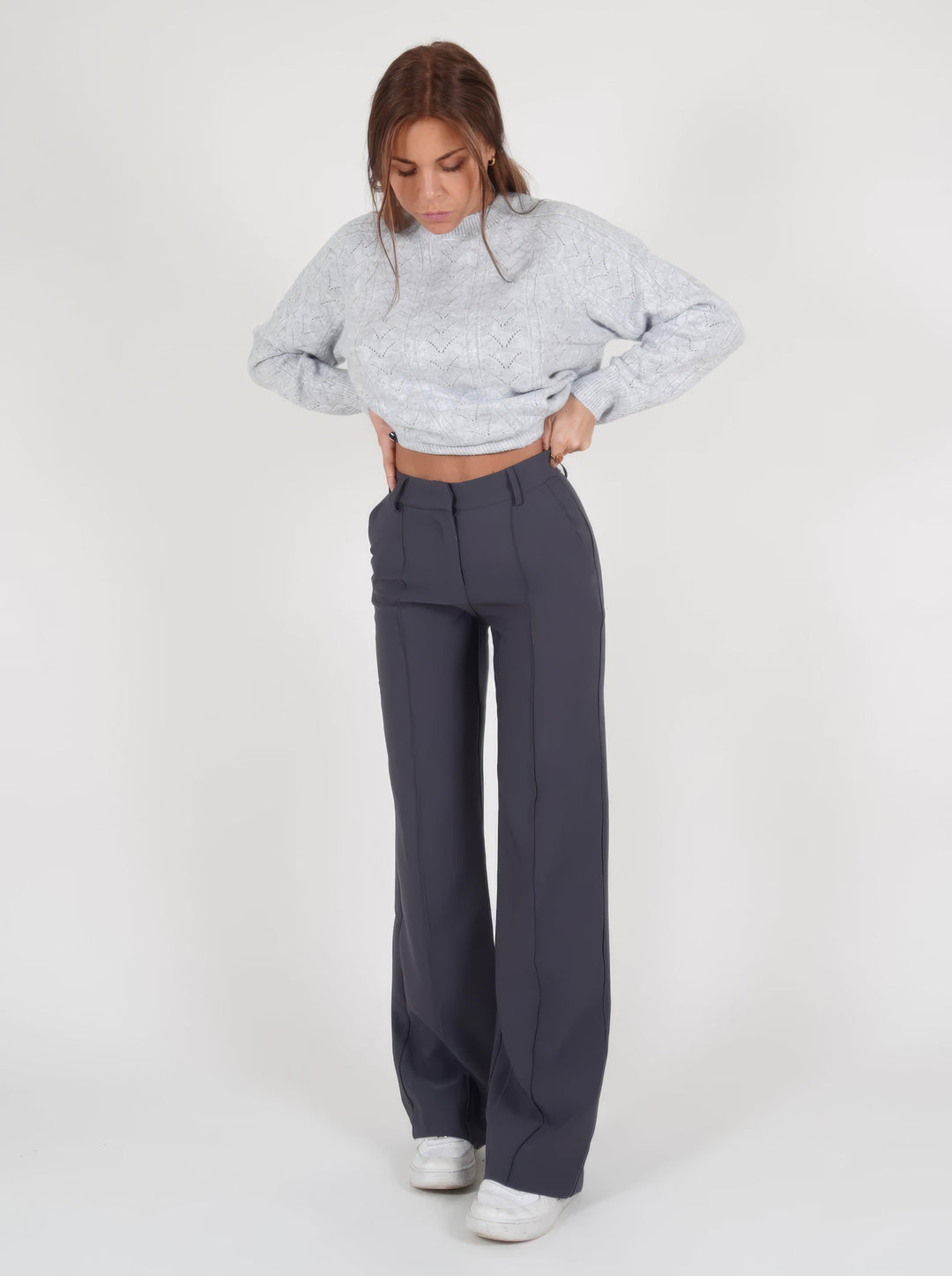 Chic high-waisted wide-leg trousers, a fashion staple for elegant and casual women's outfits.