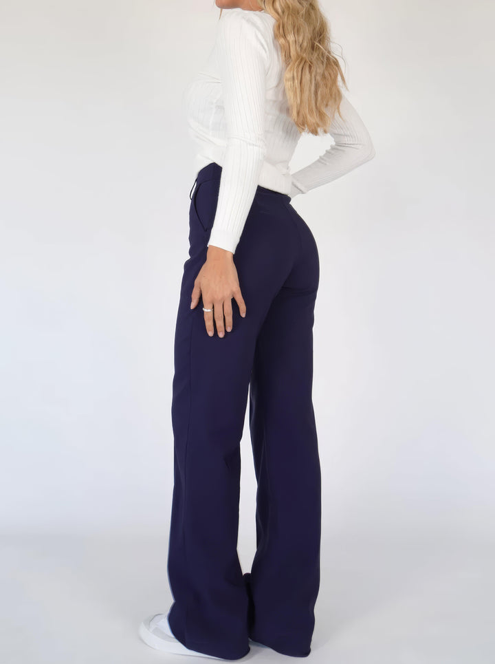 Versatile women's high-waisted wide-leg pants, key for modern workwear & chic styles.