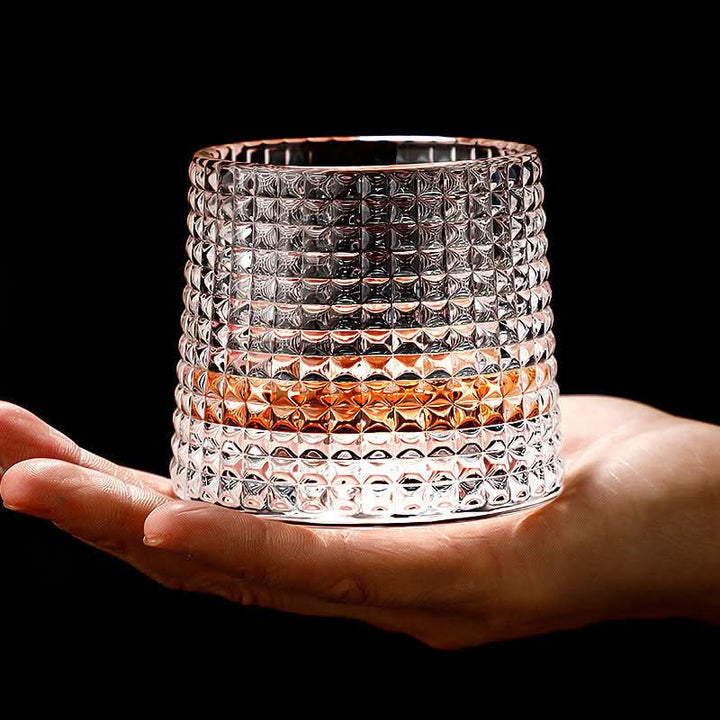 Hand-blown Japanese Edo style whiskey glass with unique spinning base. Ideal for liquor & barware collection.