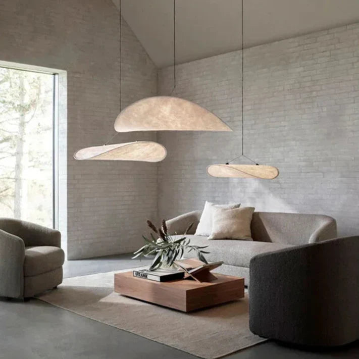 Modern Japanese chandelier, elegant silk wave design. Provides soft ambient light for contemporary home decor.