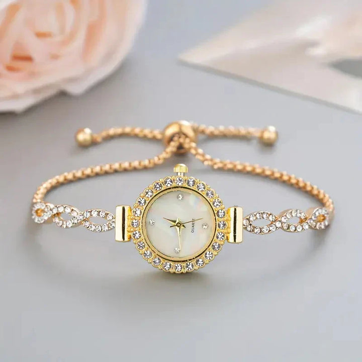 Luxury women's crystal bracelet watch, timeless design with adjustable strap. An elegant statement piece.