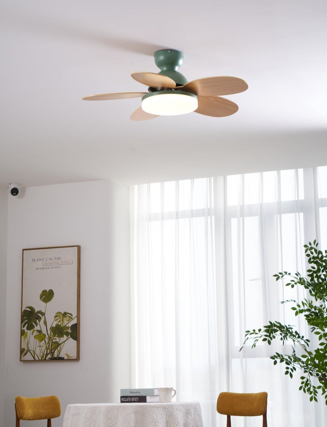 Elegant LED fan light with remote, contemporary design, quiet, perfect for large rooms.