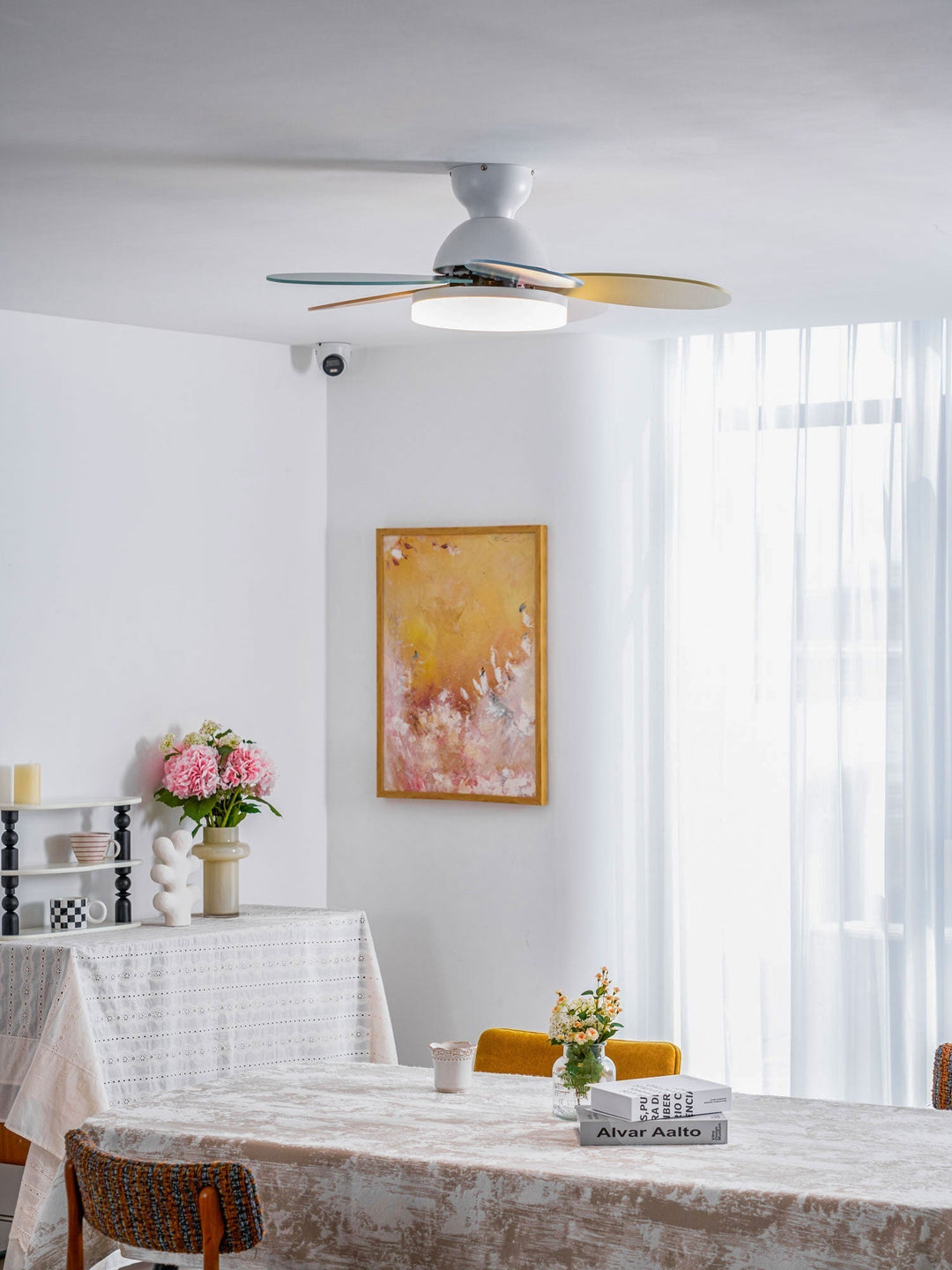 Sophisticated LED ceiling fan, energy efficient, warm light, wood blades, easy remote.