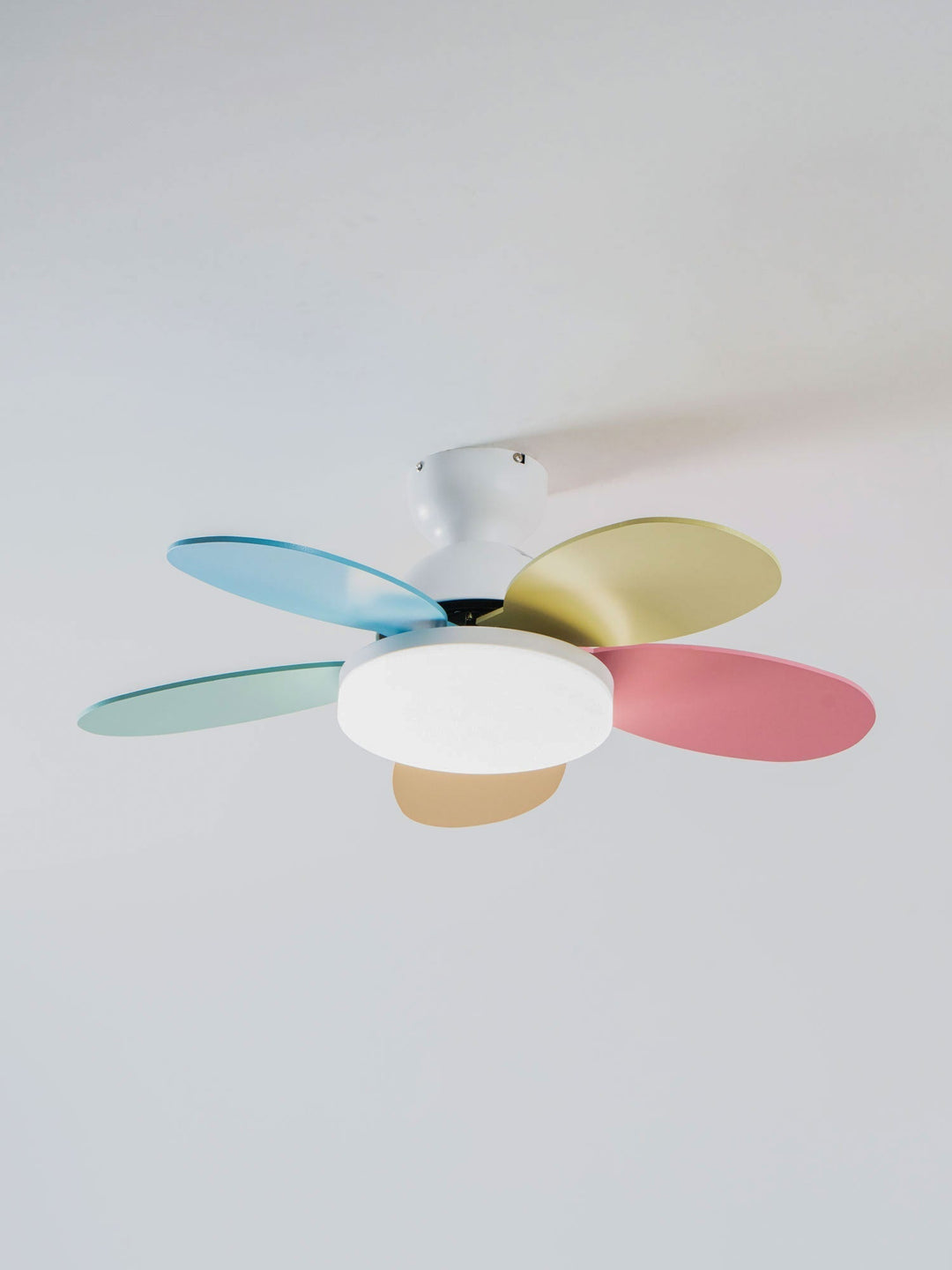 Quiet LED ceiling fan, energy-efficient, warm dimmable light, remote for serene spaces.