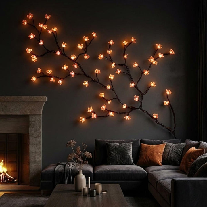 Nature-inspired LED branch wall light. Artistic and modern home decor providing a warm, ambient glow to any room.