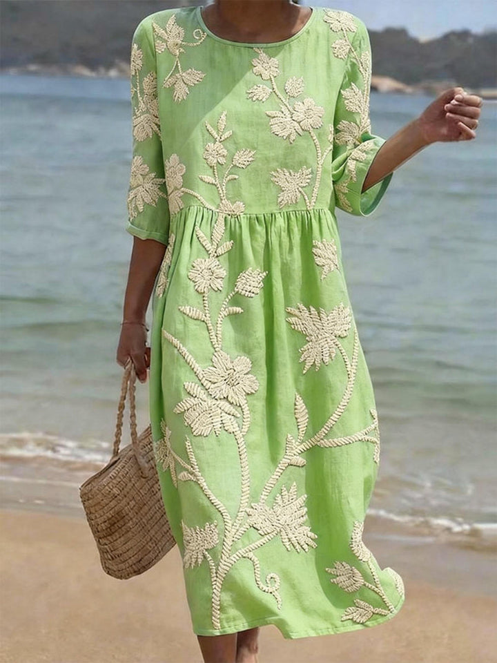 Versatile light blue midi dress, elegant embroidery, relaxed fit. Ideal for women's spring/summer fashion.