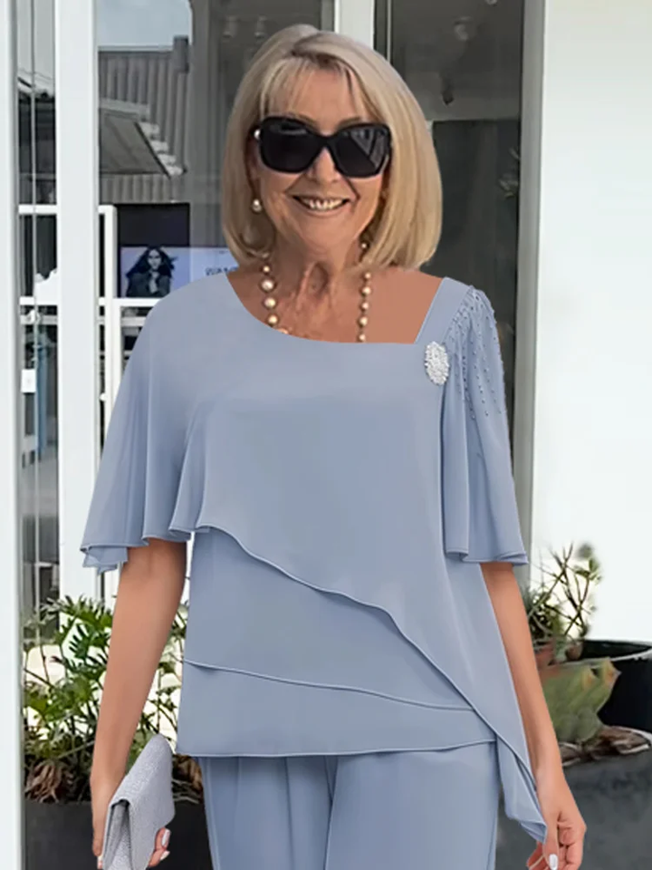 Feminine & elegant women's summer two-piece skirt set in light blue, perfect for a chic & comfortable outfit.