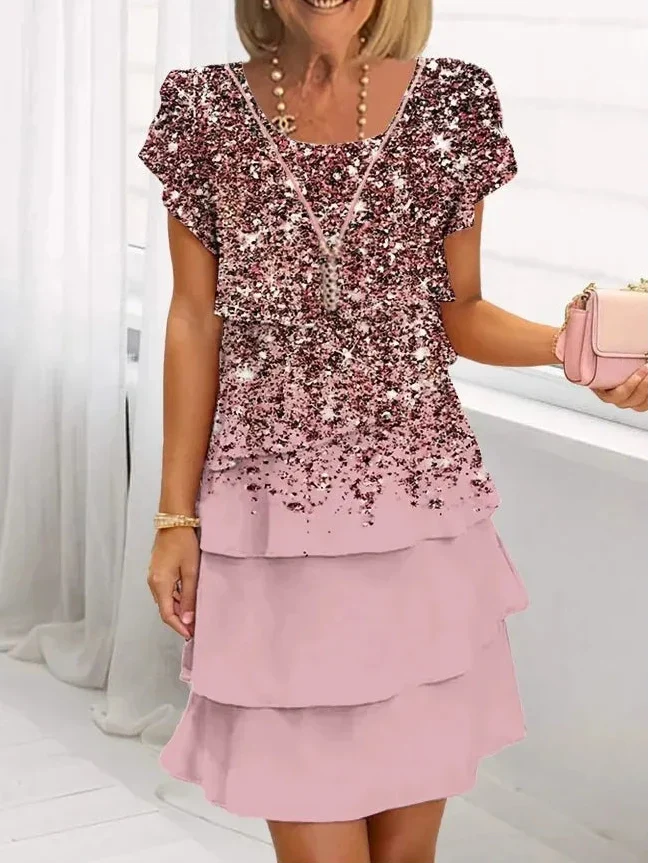 Elegant light pink A-line women's ruffle comfort dress, perfect for spring/summer or special occasions.