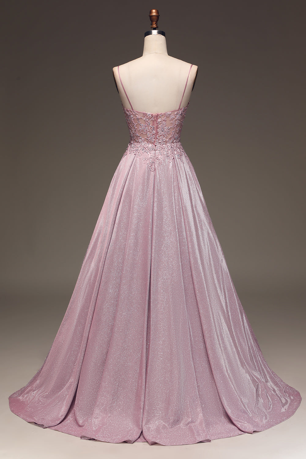 Women's formal light pink maxi dress with elegant embellishments, ideal as a wedding guest dress or for special occasions.