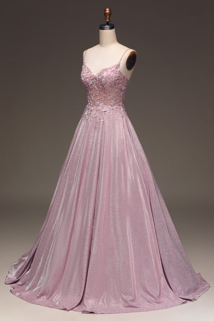 Sophisticated A-line light pink maxi dress, beautifully embellished for women attending a wedding or formal evening event.