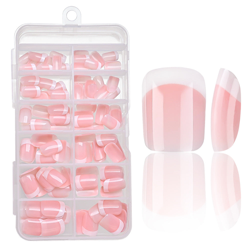 Light yellow French tip press-on false nails for women. Elegant artificial nails kit for a quick and beautiful nail art style.