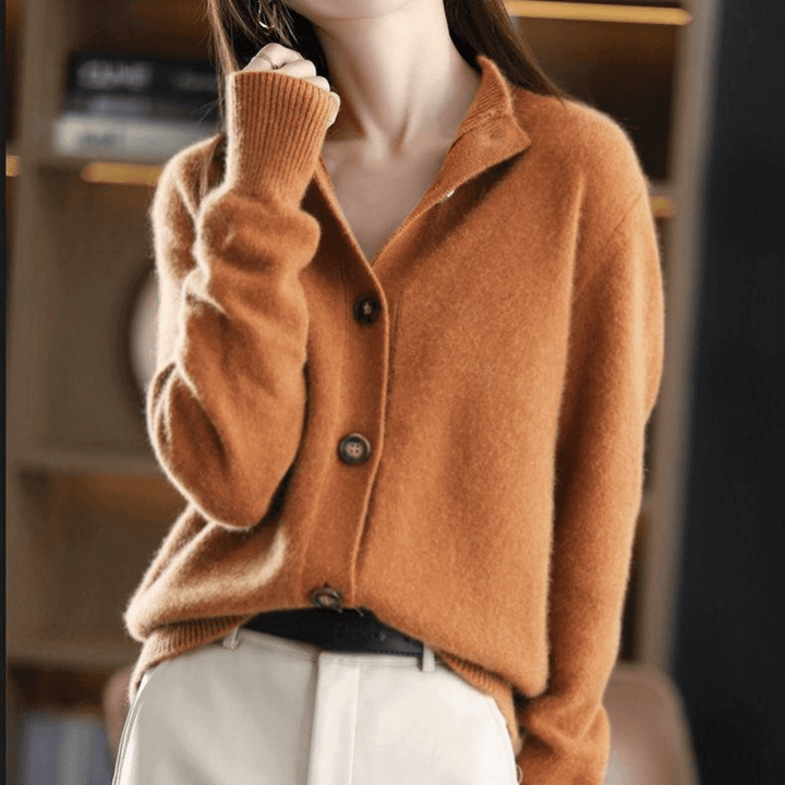 Chic beige women's cardigan, a lightweight long-sleeve sweater perfect for elegant layering in spring outfits.