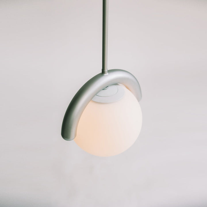 Modern adjustable linear pendant, stylish glass chandelier for elegant home decor.