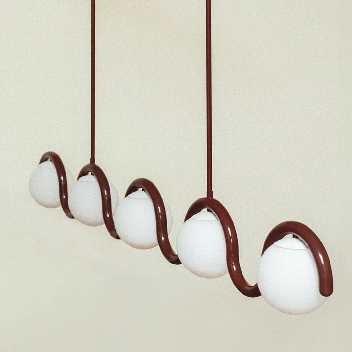 Linear glass & metal pendant light, sleek modern design for a chic dining experience.