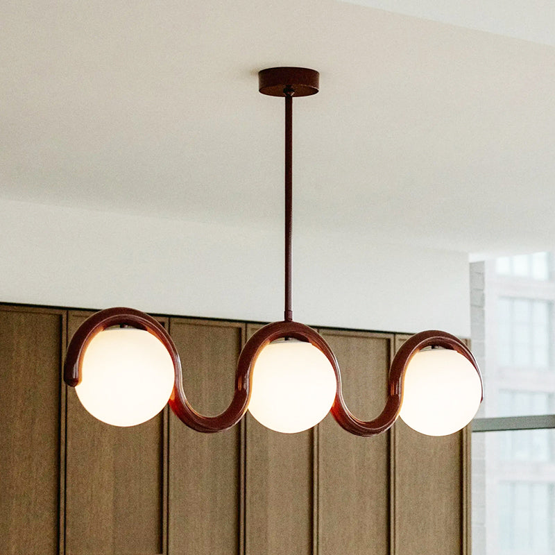 Sleek adjustable linear pendant light, contemporary metal & glass for living room.