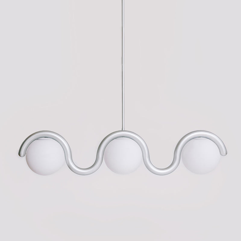 Sleek modern linear chandelier, adjustable glass and metal design for living rooms.