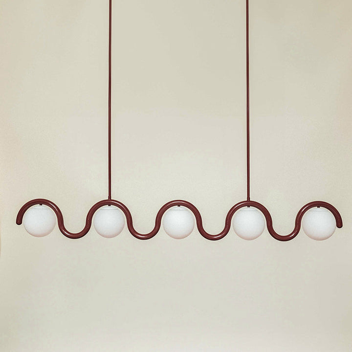 Contemporary linear pendant, stylish glass & metal ceiling light for home decor.
