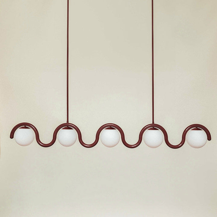 Contemporary adjustable linear pendant, sophisticated glass & metal fixture for dining.