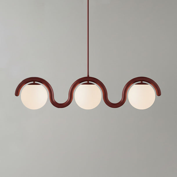 Sleek linear pendant, modern glass & metal ceiling light for contemporary living.