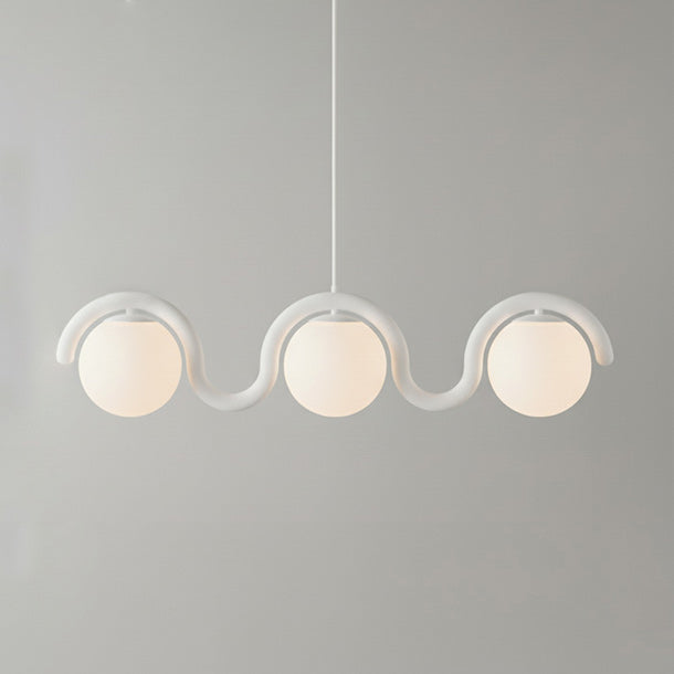 Stylish linear pendant light, contemporary glass & metal for chic home interiors.