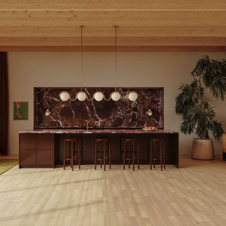 Stylish adjustable linear ceiling light, elegant metal & glass design for home decor.