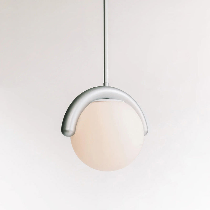 Contemporary linear chandelier, glass and metal construction for modern home decor.