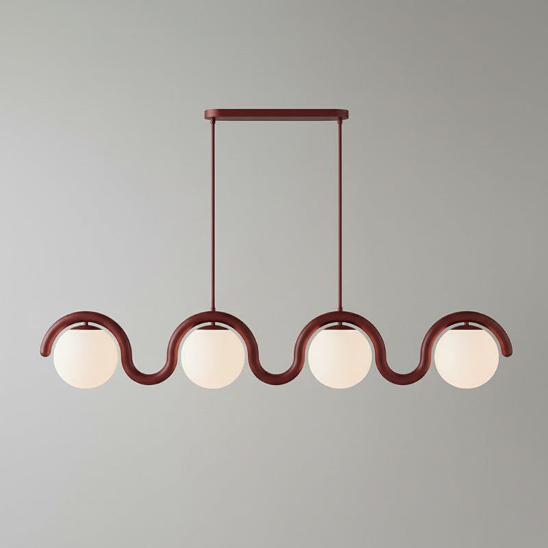 Contemporary linear pendant, sleek glass & metal fixture for dining room decor.