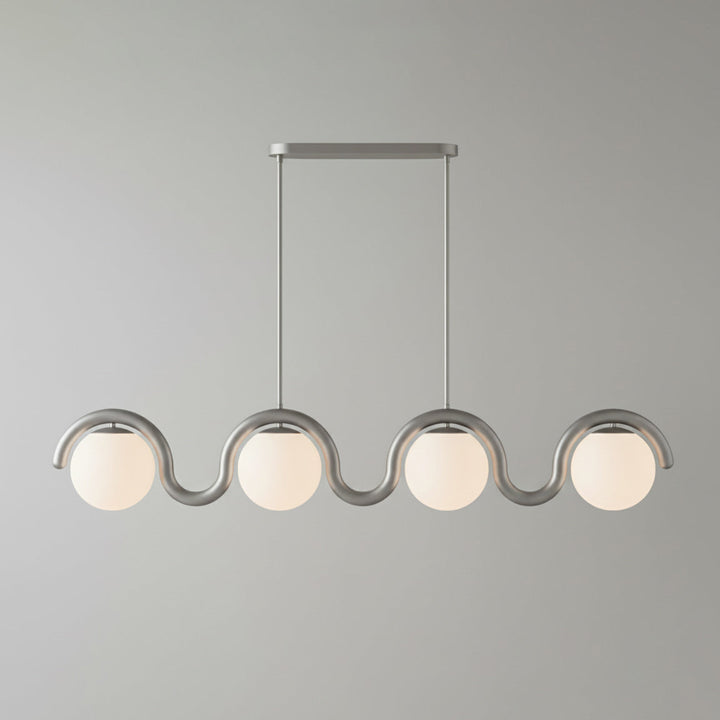 Sleek linear chandelier, adjustable glass & metal for modern dining.