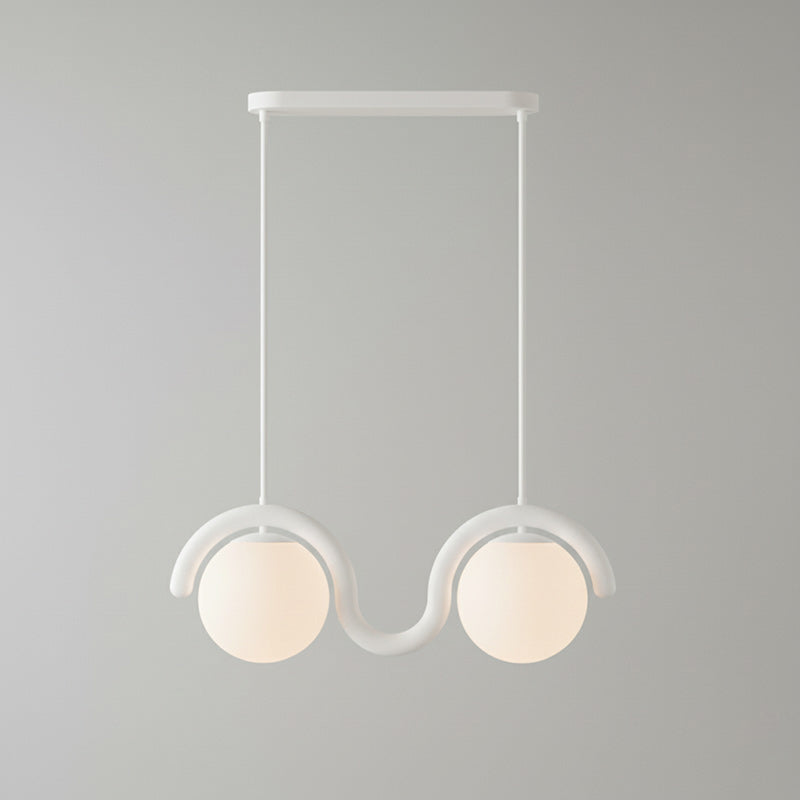 Stylish linear pendant, contemporary glass and metal for home decor.
