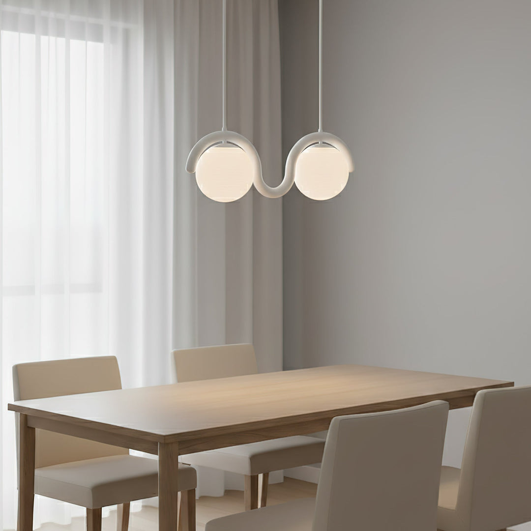 Sleek linear light, contemporary glass & metal for living room.
