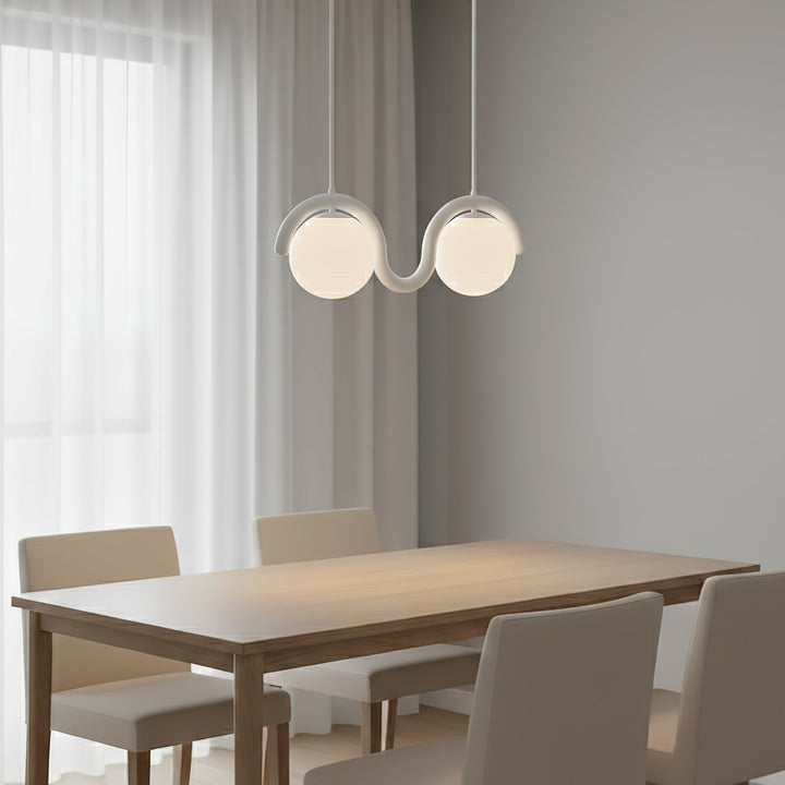 Sleek linear light, contemporary glass & metal for living room.