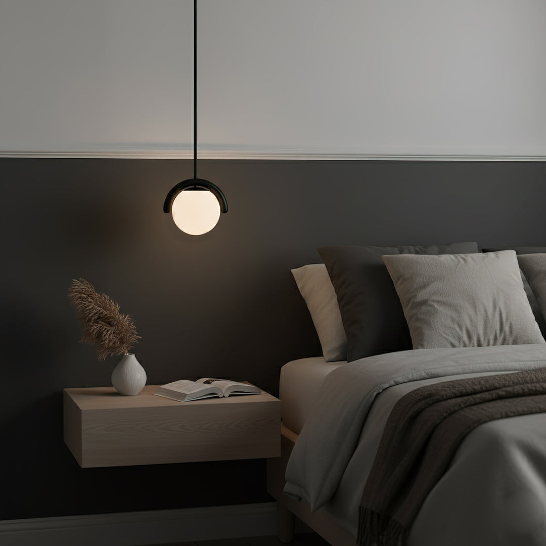 Modern linear pendant, elegant glass & metal adjustable for home decor.