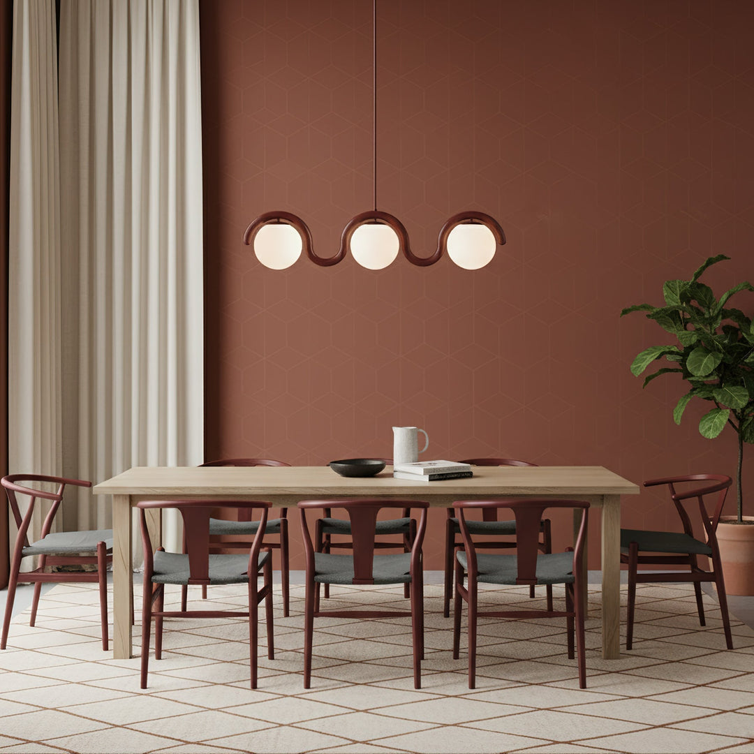Stylish linear chandelier, glass & metal for modern dining room.