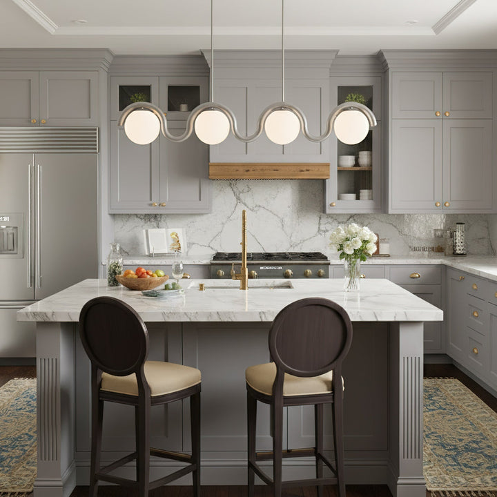 Stylish linear pendant, glass & metal for modern living room.
