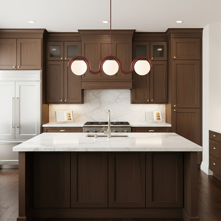 Elegant linear chandelier, adjustable glass & metal for dining area.