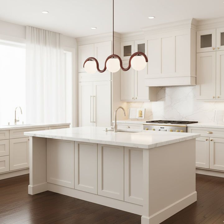 Sleek linear chandelier, glass & metal for modern dining.