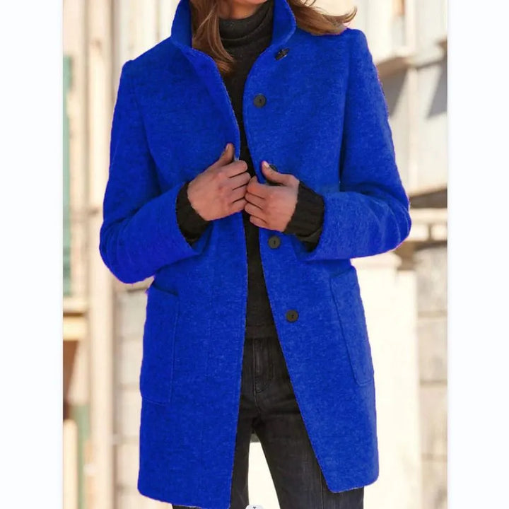 Classic women's long coat. Elegant outerwear offering a timeless fit & comfort for winter and autumn style.