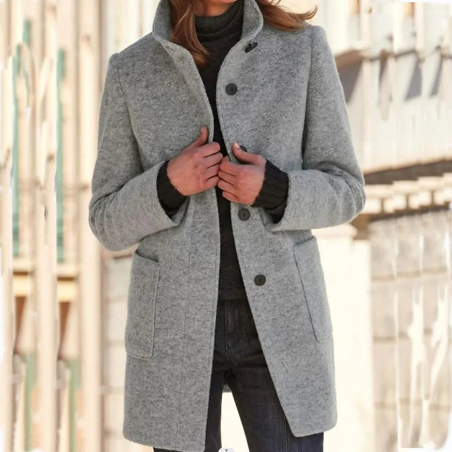 Women's stylish button-front long coat. Elegant & versatile outerwear for autumn, winter, and professional settings.