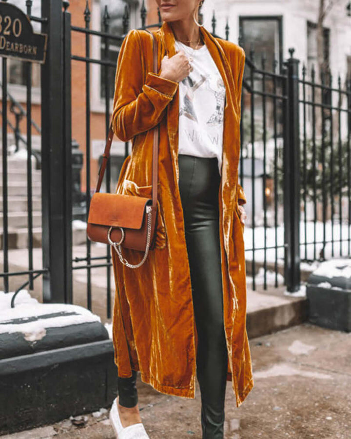 Women's elegant long duster cardigan, a comfortable and flowing layering piece.