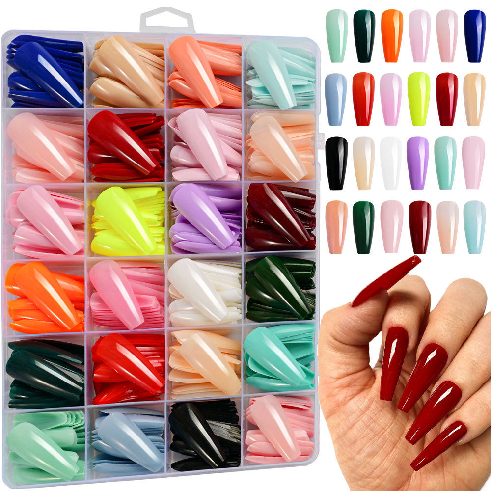 Stunning women's long false nail tips in a natural elegant shade, ideal for easy DIY press-on manicures.