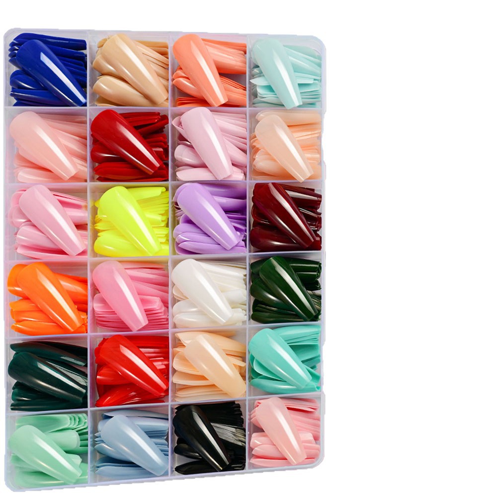 Beautiful long false nail tips for women, providing an elegant and stunning manicure. Great for nail art beauty.