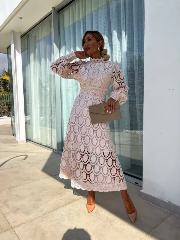 Elegant long sleeve women's party dress in a flowing design, perfect for evening wear and formal celebrations.
