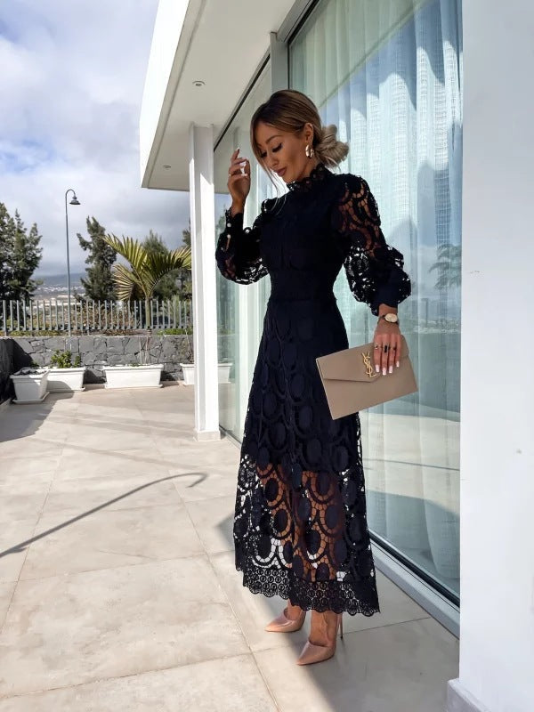 Flowy long sleeve women's party dress, elegant silhouette, suitable for formal evening wear & celebrations.
