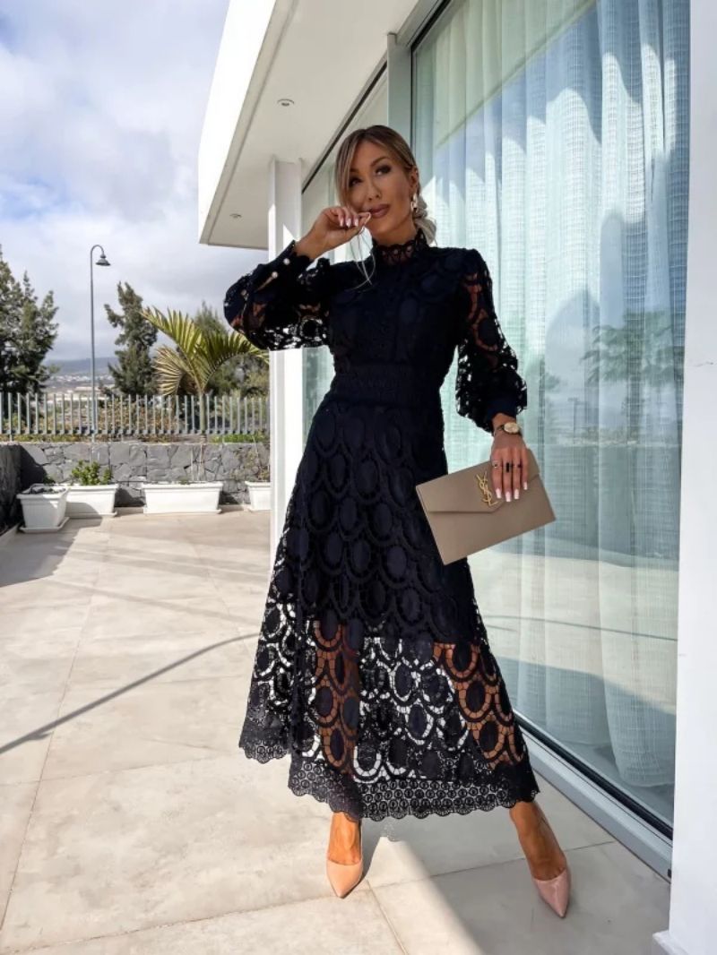 Formal women's long sleeve dress, elegant evening wear for parties and special celebrations, sophisticated design.